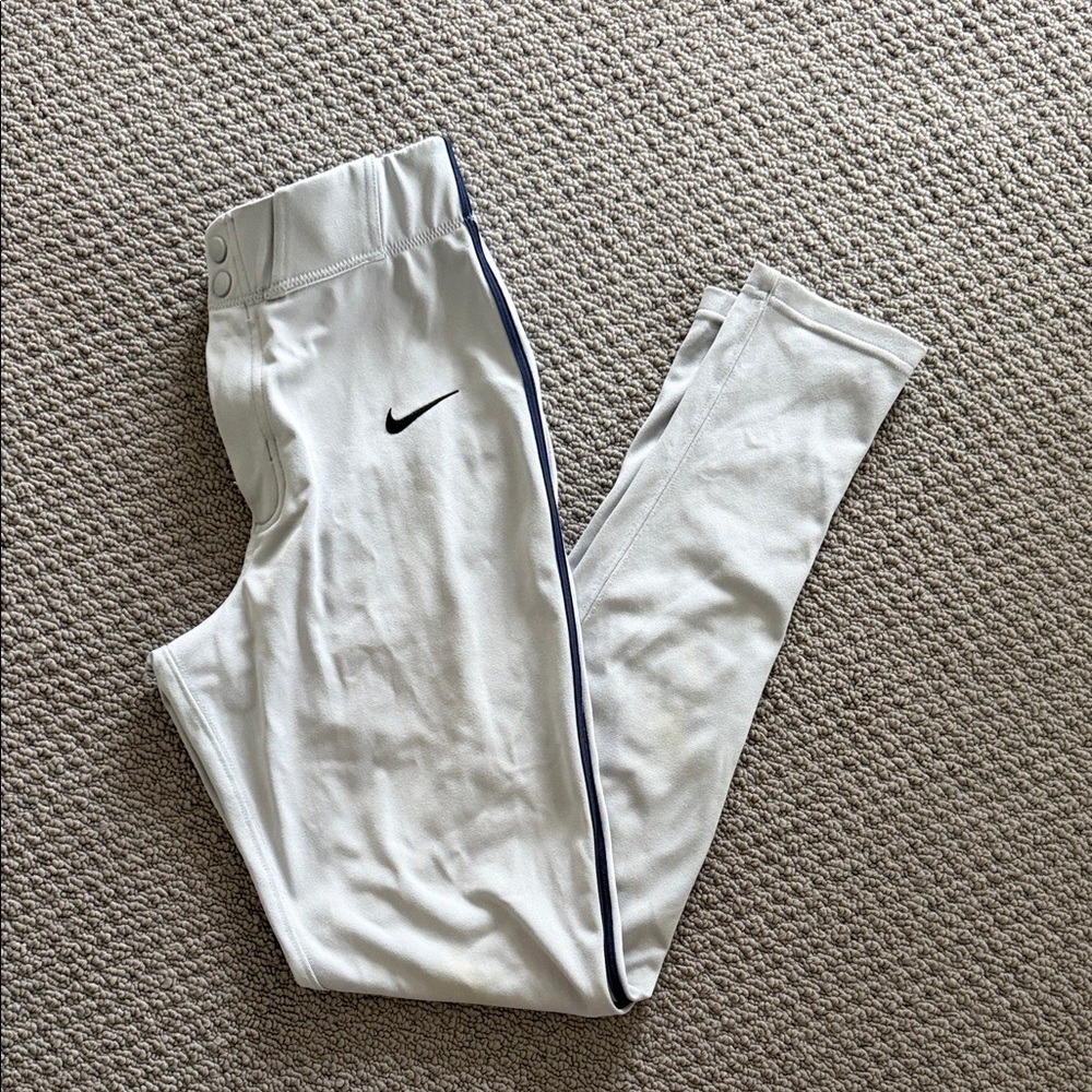 Nike Gray Baseball pants with Navy Side Stripe and Black Swoosh Accent